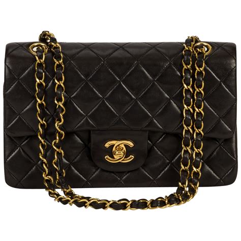 black chanel bag gold chain|chanel purses black original.